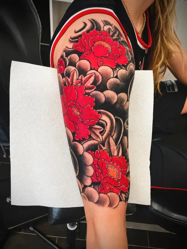 Traditional Japanese red peony and cloud half-sleeve tattoo, Irezumi style, N9 Tattoo, North London